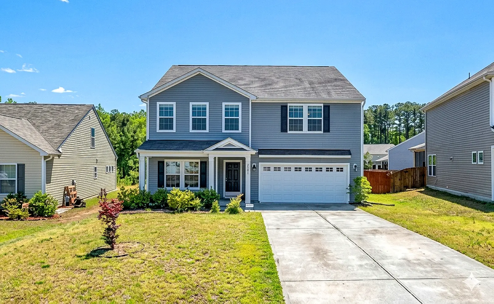 Gray Two Story With Attached Garage Grass Crop Pic